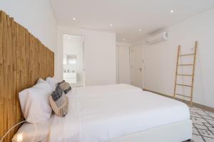 Postel nebo postele na pokoji v ubytování Areia Villa, with ocean view