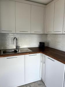 Η κουζίνα ή μικρή κουζίνα στο New renovated studio with outstanding view