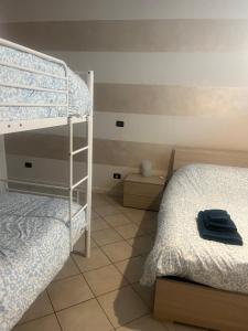 Postel nebo postele na pokoji v ubytování Casa Carlotta