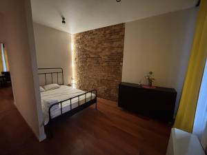 Postel nebo postele na pokoji v ubytování KK Apartament Marszałkowski