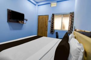 TV a/nebo společenská místnost v ubytování Hotel O Srinath palace