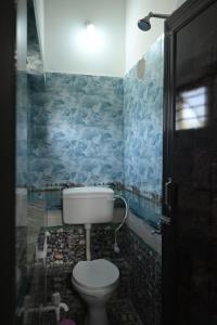 Ένα μπάνιο στο Muktadhara Eco Homestay