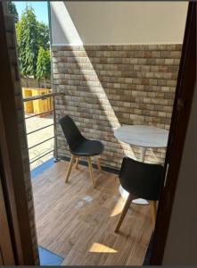 Balkón nebo terasa v ubytování GOOD MOVE INVESTMENt + 2 fotografie