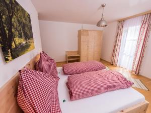 Voodi või voodid majutusasutuse Hinterkellaubauer toas