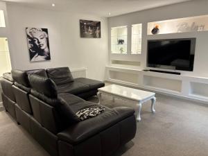 Μια τηλεόραση ή/και κέντρο ψυχαγωγίας στο Big comfort Bungalow incl Carcharger
