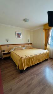 Ένα ή περισσότερα κρεβάτια σε δωμάτιο στο Hotel Arenas Blancas