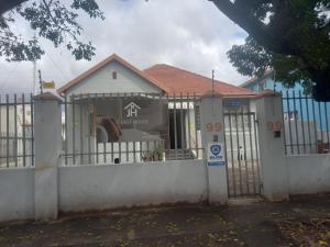 a house with a gate in front of it at JH Guest house in Durban