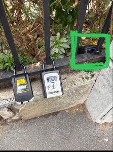 a gas meter hanging from a pole with a thermometer at Comfortable Studio à proximité de porte Versaille , Paris in Vanves