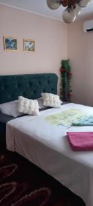 Postel nebo postele na pokoji v ubytování Apartman Irmel
