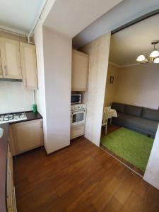 Η κουζίνα ή μικρή κουζίνα στο Іващенка 1а