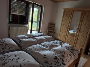Postel nebo postele na pokoji v ubytování Ferienhaus Gerlinde