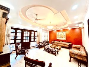 Χώρος καθιστικού στο South Residency - South Delhi by South INN