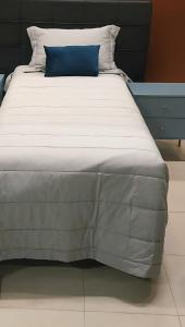 Ένα ή περισσότερα κρεβάτια σε δωμάτιο στο Apartamento-Cop 30 - 1 quarto e 2 suites