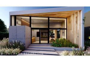 a facade of a house with glass doors at Vistalba Hotel Aparts & Suites in Ciudad Lujan de Cuyo