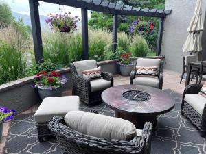 a patio with chairs and a table and a table and chairs at Summit 2 Condo 2836 in Elkhorn Village