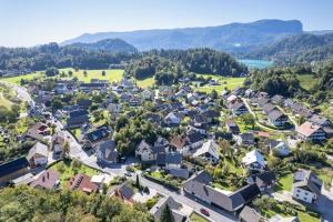 an aerial view of a small town with houses at Apartments Artemida in Bled