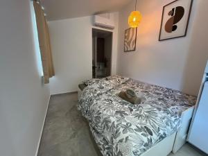 Postel nebo postele na pokoji v ubytování La lodge de la gare