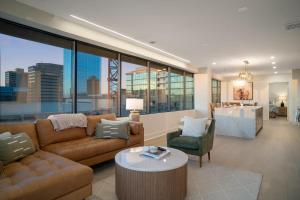 a living room with a couch and a table at Thoroughbred Retreat Unit 803 in Lexington