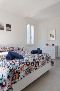 Ένα ή περισσότερα κρεβάτια σε δωμάτιο στο CARPI SUITE - Lorca House