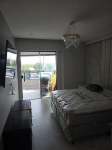 Ένα ή περισσότερα κρεβάτια σε δωμάτιο στο High standard apartment for the COP30
