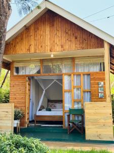 a bedroom in a house with a bed in it at Karibu Africa Home in Moshi