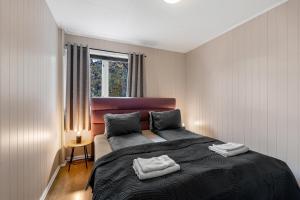 Postel nebo postele na pokoji v ubytování Family Home Downtown