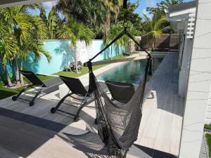 Hồ bơi trong/gần Villa de Luxe avec Piscine Privée et Jacuzzi à la Baie Orientale, Marigot - FR-1-734-1