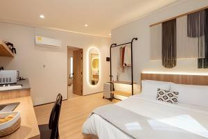 Postel nebo postele na pokoji v ubytování Casa Fiora Oasis