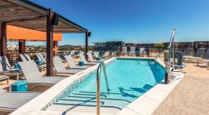 a swimming pool on top of a building at The Stay 1 - Navy Yard Washington DC in Washington