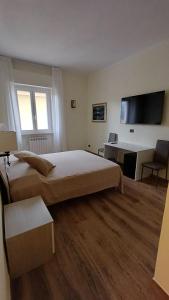 TV a/nebo společenská místnost v ubytování Max studios