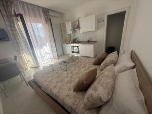 Postel nebo postele na pokoji v ubytování Home Sorrento