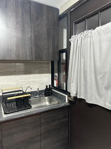 Η κουζίνα ή μικρή κουζίνα στο Modern apartment with pool near VW-Finsa