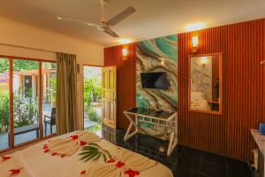 Katil atau katil-katil dalam bilik di Thoddoo Beach Holiday +105 gambar