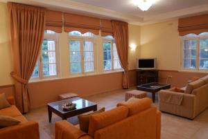 Posezení v ubytování Hotel Oiti