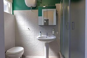 Koupelna v ubytování 70 mt di confort con terrazzo interno privato + 19 fotografií