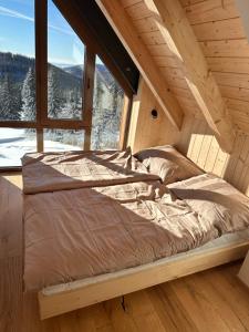 Postel nebo postele na pokoji v ubytování Chata Rebelka