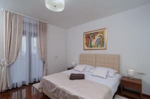 เตียงในห้องที่ Luxury Rooms Near the Beach1 +19 ภาพ