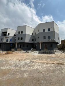 a large building is under construction in a field at Ladi's place Wuye, Abuja in Abuja