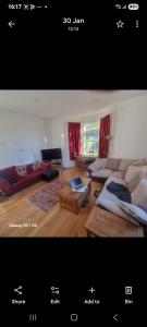 a living room with a couch and a table at Sunderland 2-Bedroom Gem Near City in Sunderland
