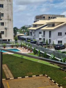 a view from the balcony of a building at 1 Bedroom Apt Sabolak Suite Haven in Ikate