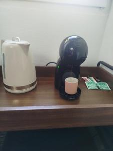 Kaffe- og tefaciliteter på Petit nid Dacquois