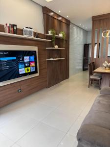 Televisyen dan/atau pusat hiburan di Casa no Jardim Abrel