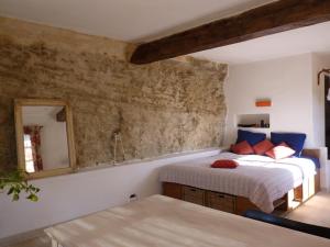Postel nebo postele na pokoji v ubytování La Baumo 1 und 2