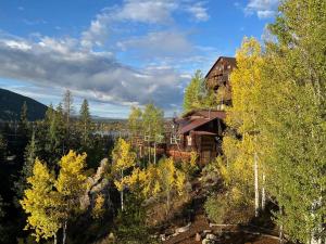 an aerial view of a house in the trees at Shadowcliff Mountain Lodge & Retreat Center in Grand Lake