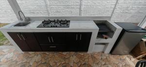 Kuchyň nebo kuchyňský kout v ubytování Villa Iguanas + 12 fotografií