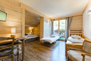 Postel nebo postele na pokoji v ubytování Hôtel La Montagne