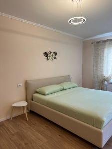 Кровать или кровати в номере Air B&B Hotel +2 фотографии