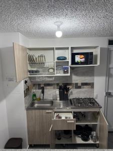 Η κουζίνα ή μικρή κουζίνα στο Loft Vacaciional