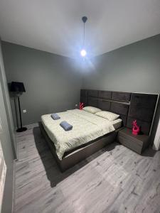 a bedroom with a large bed with pink bows on it at Sea and Natural Adalet Suits in Çağlayan +11 photos
