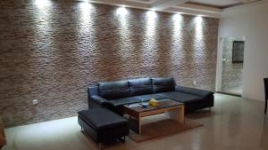 Ein Sitzbereich in der Unterkunft Riviera Taouyah Hotel